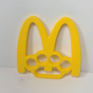 The McKnuckleduster 3D Printed McDonald's-Inspired Novelty Toy This not a weapon